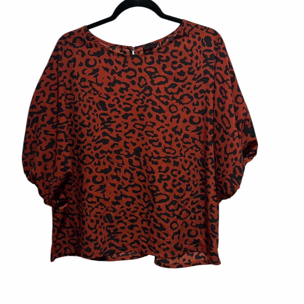 Chic Animal Print Blouse in Red and Black